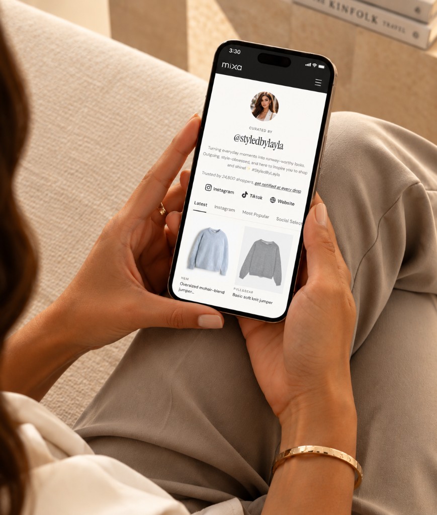 Shopper on a sofa browsing a creator storefront on her phone